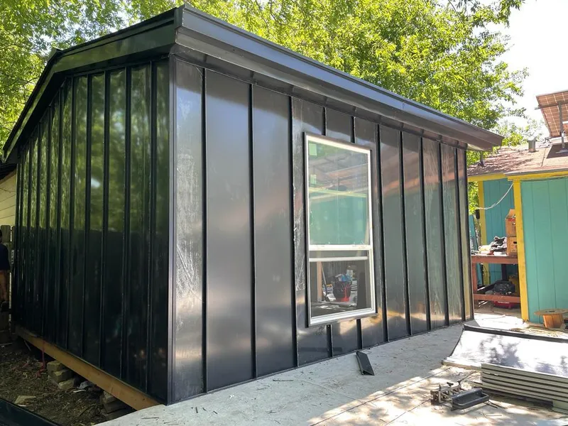 Black standing seam metal wall panels for Roof Inspection in Chestnut Ridge
