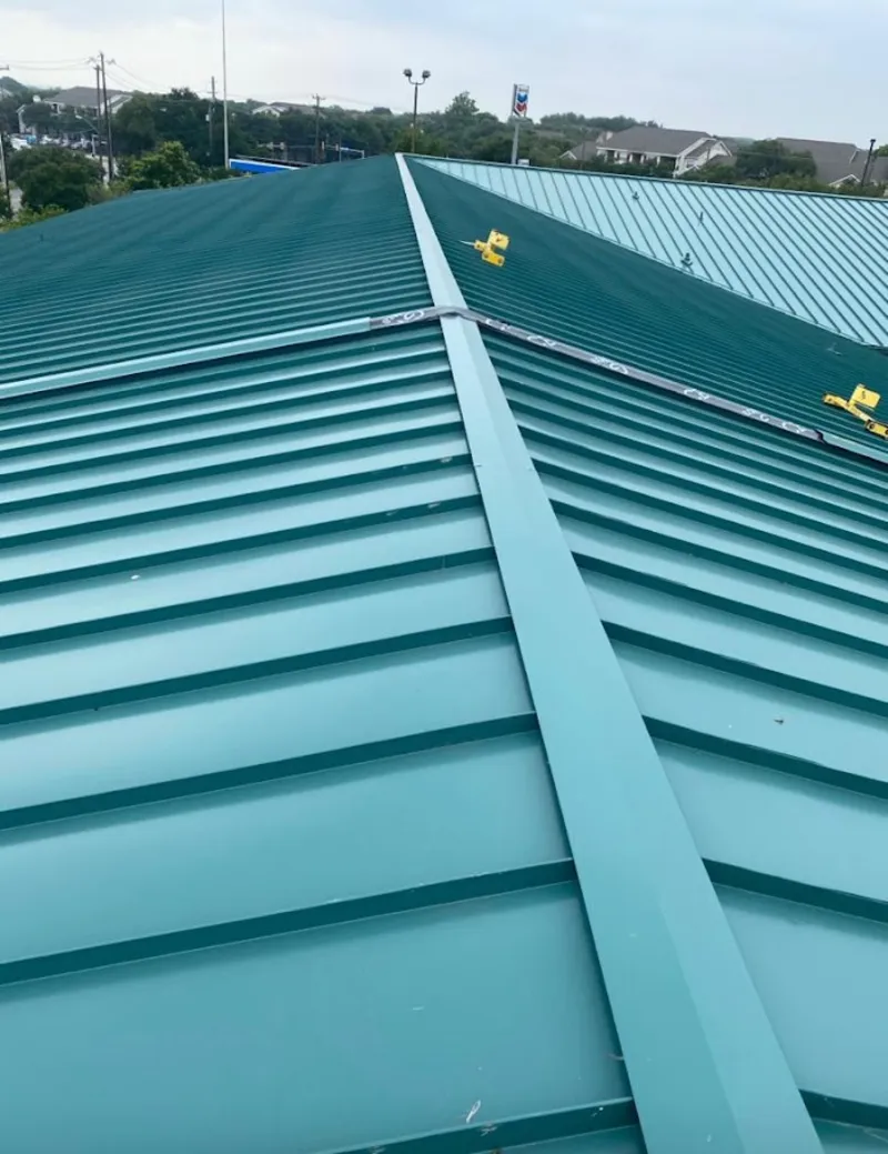 Green commercial metal roof ridge and valley for Metal Roof Repair in Chestnut Ridge